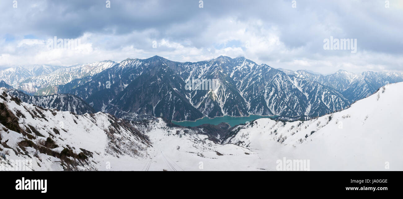 Panorama of Snow Mountain Range Landscape view point with Blue Sky from Matsumoto to Toyama, Tateyama Kurobe Alpine Route, Japan Alps. Famous place la Stock Photo
