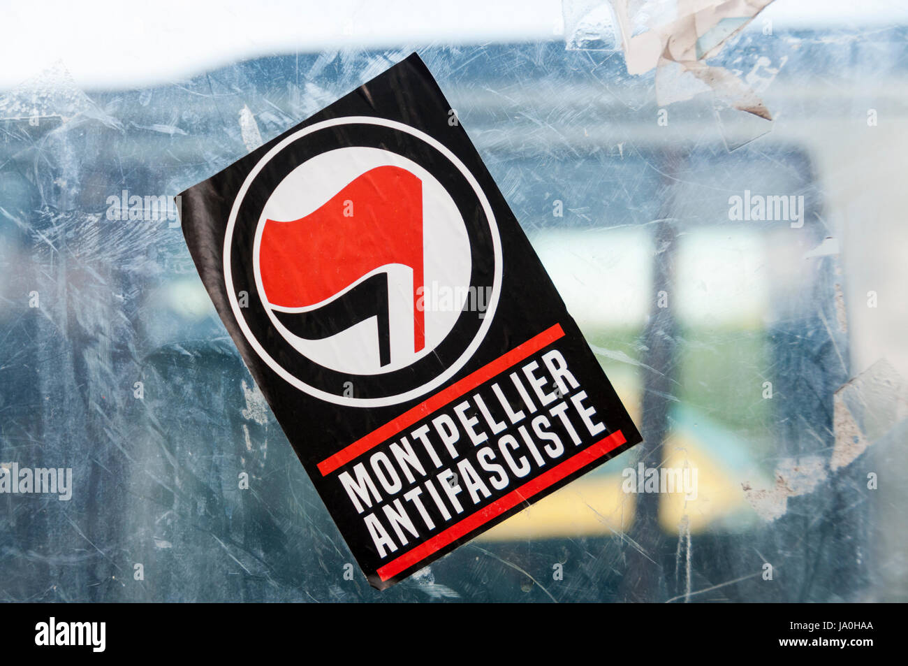 Antifa symbol on a Montpellier Antifasciste sticker in Montpellier in the south of France. Stock Photo