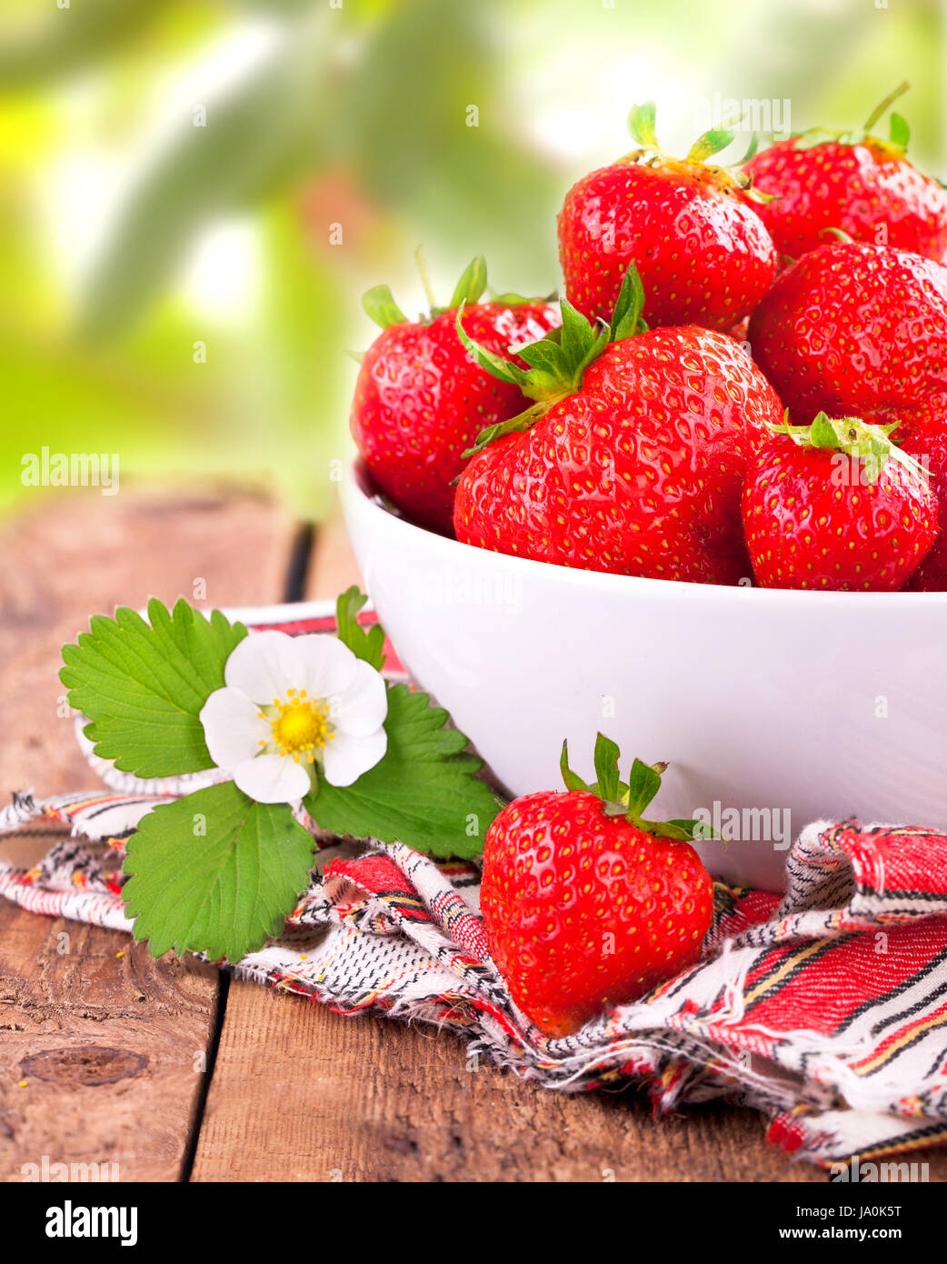 freshly picked strawberries in the garden Stock Photo - Alamy