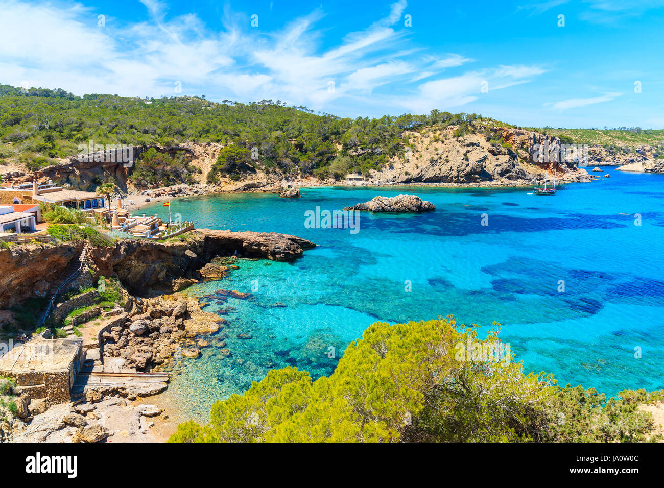 Stunning view of Cala Xarraca beach with azure sea water on northern coast of Ibiza island, Spain Stock Photo