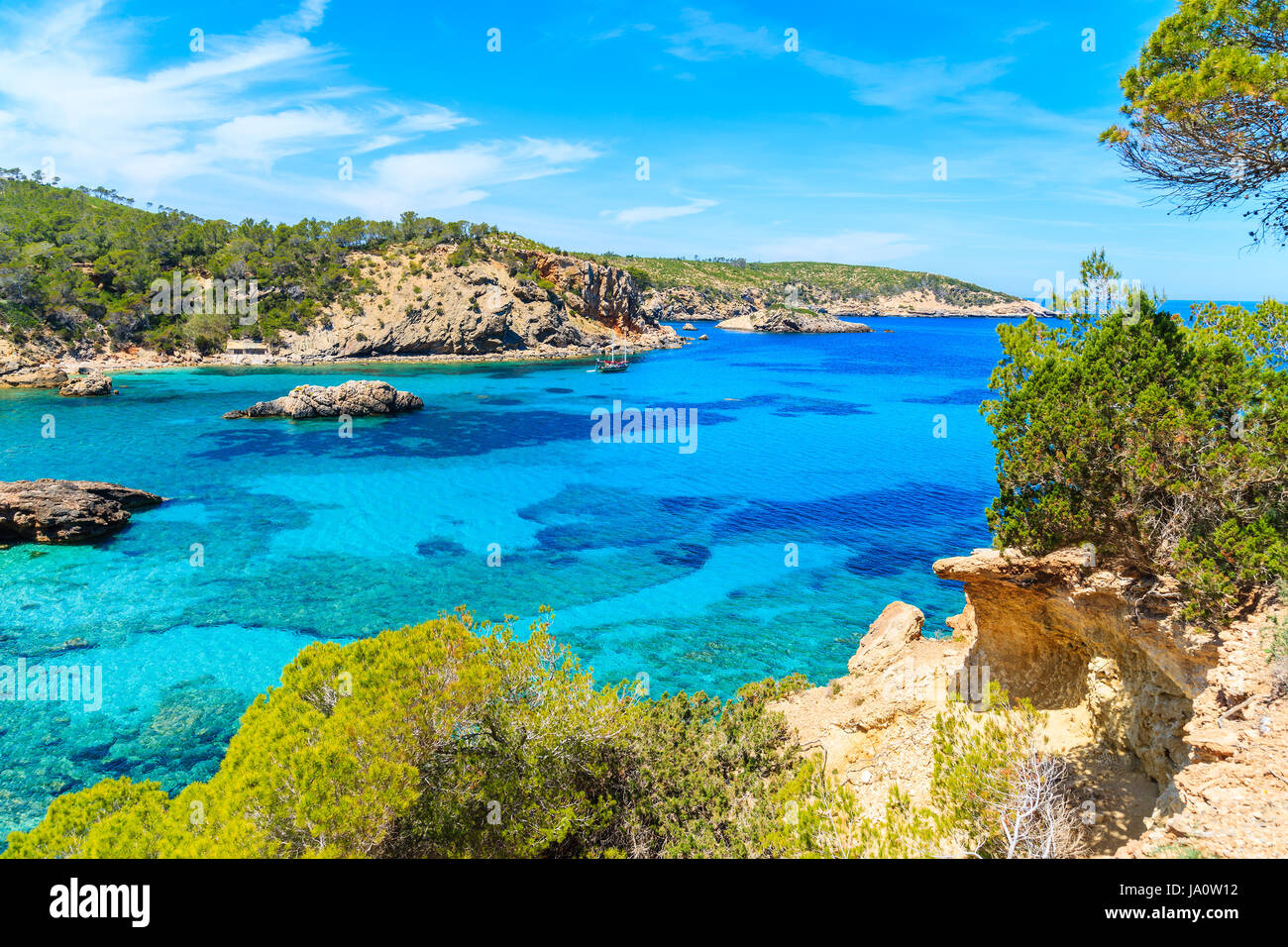 Stunning view of Cala Xarraca bay with azure sea water on northern coast of Ibiza island, Spain Stock Photo