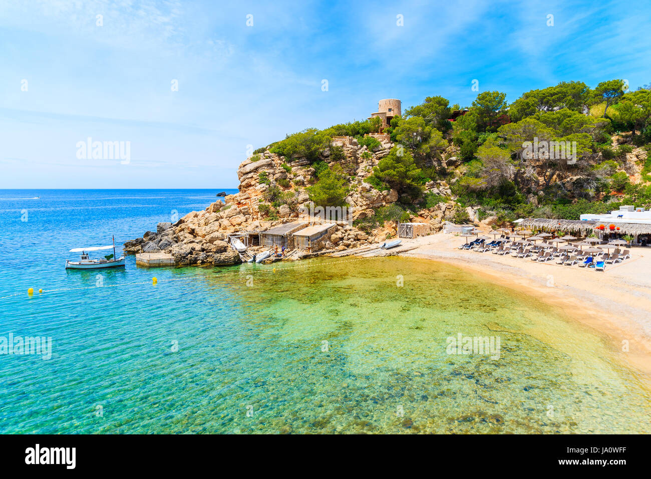 View Of Beautiful Cala Carbo Bay With Emerald Green Sea Water Ibiza view-of-beautiful-cala-carbo-bay-with-emerald-green-sea-water-ibiza