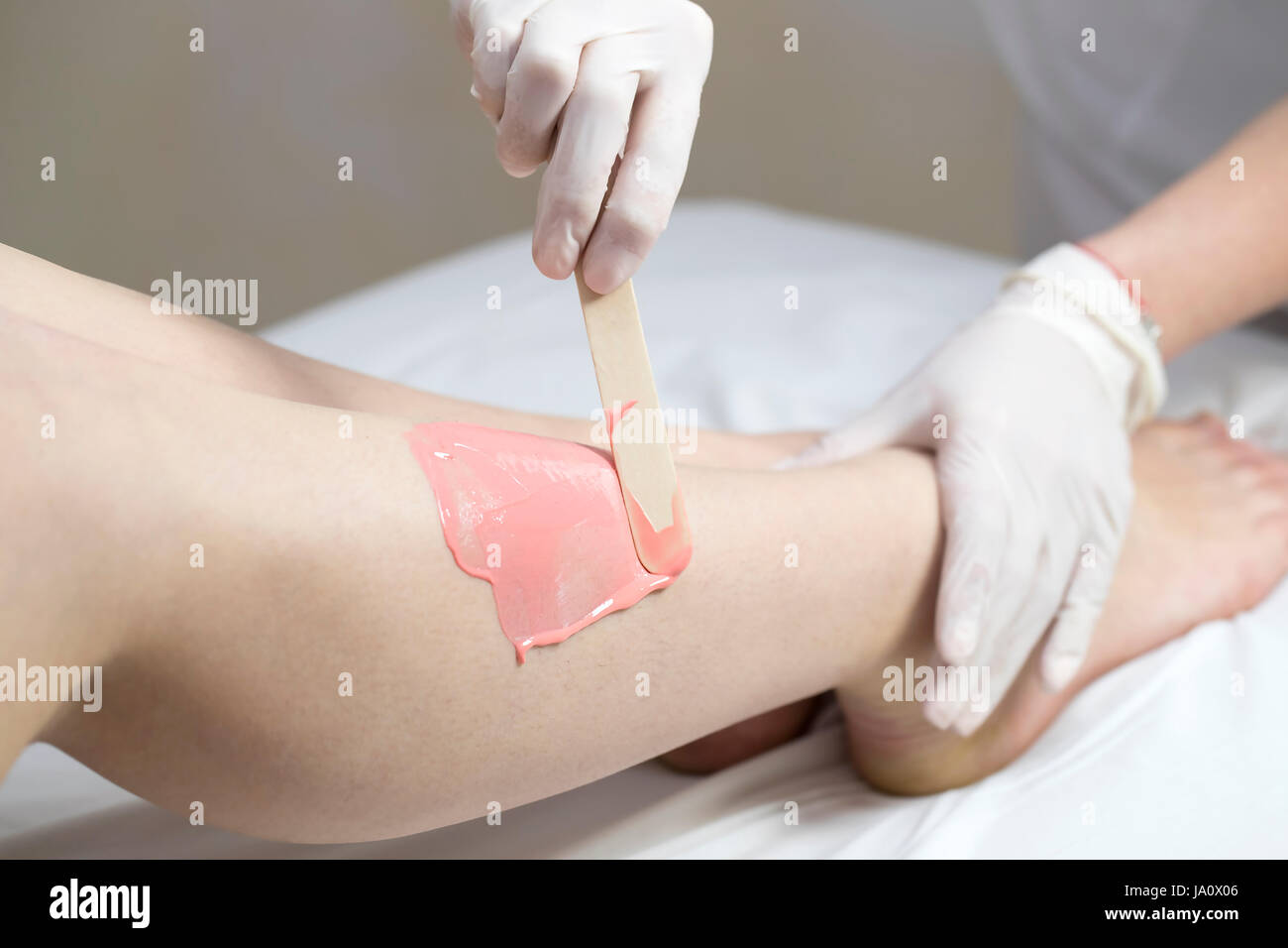Process depilation female legs and hands in a beauty salon Stock Photo ...