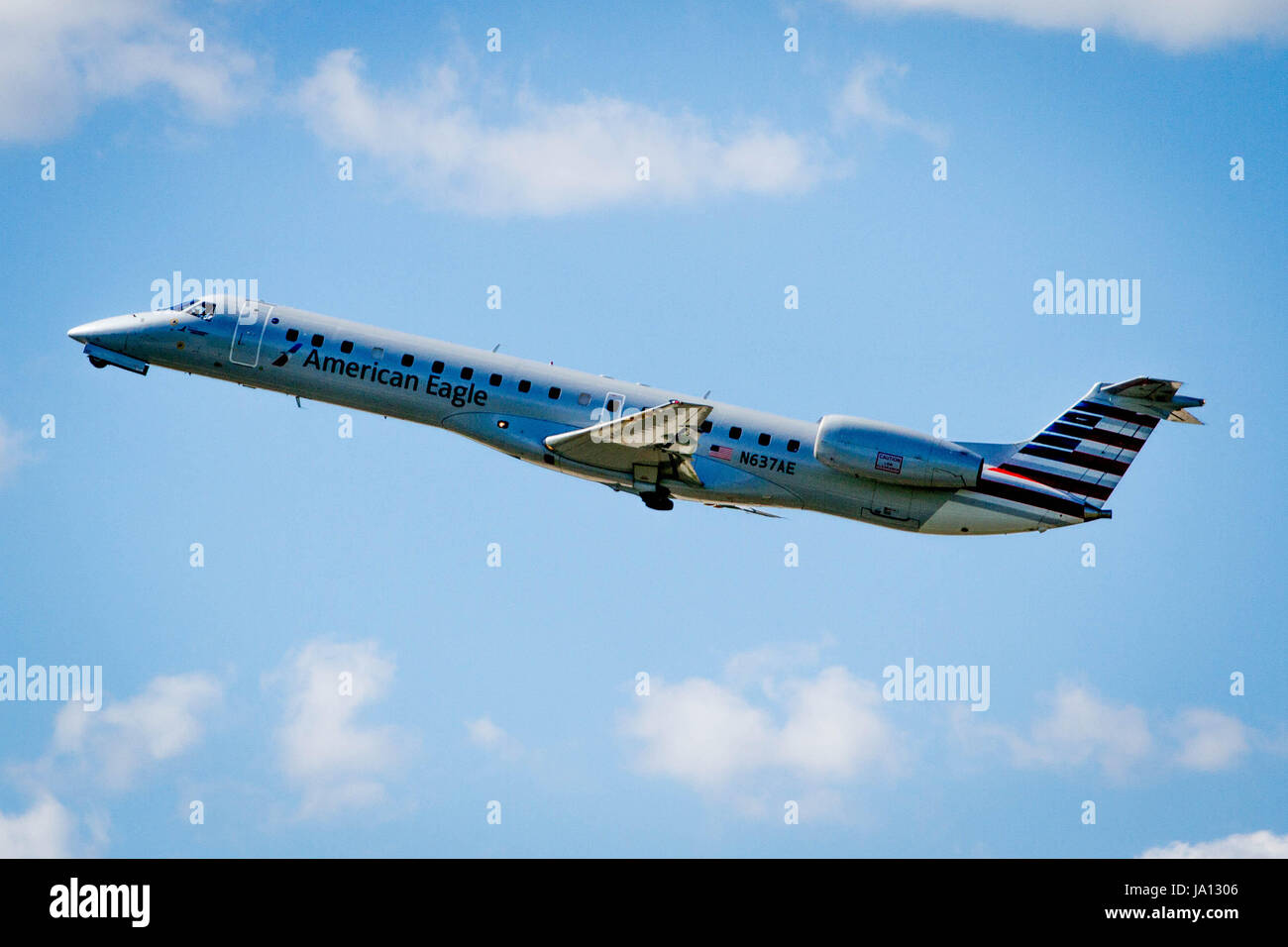 An American Eagle commuter aircraft takes off from Philadelphia International Airport Stock Photo