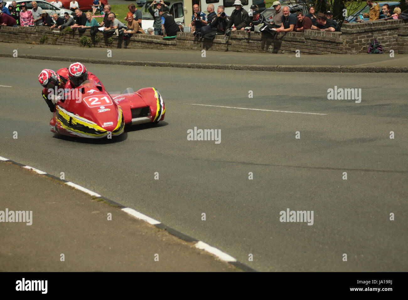 Isle of Man TT Races, Sidecar Qualifying Practice Race, Saturday 3 June 2017. Sidecar qualifying session.  Number 21, Mick Alton and Chrissie Clancy on their 600cc, LCR Suzuki of the J & C Contracting team from Wedderbum, UK.. Credit: Eclectic Art and Photography/Alamy Live News. Stock Photo