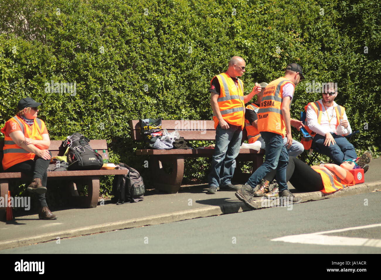 Isle of Man TT Races, Qualifying Practice Race, Saturday 3 June 2017.Sidecar Qualifying and Supersport/Lightweight/Newcomers (all classes) qualifying session. Marshals relaxing in the sunshine in between the sessions. At Cruickshanks Corner, Ramsey, Isle of Man Credit: Eclectic Art and Photography/Alamy Live News Stock Photo