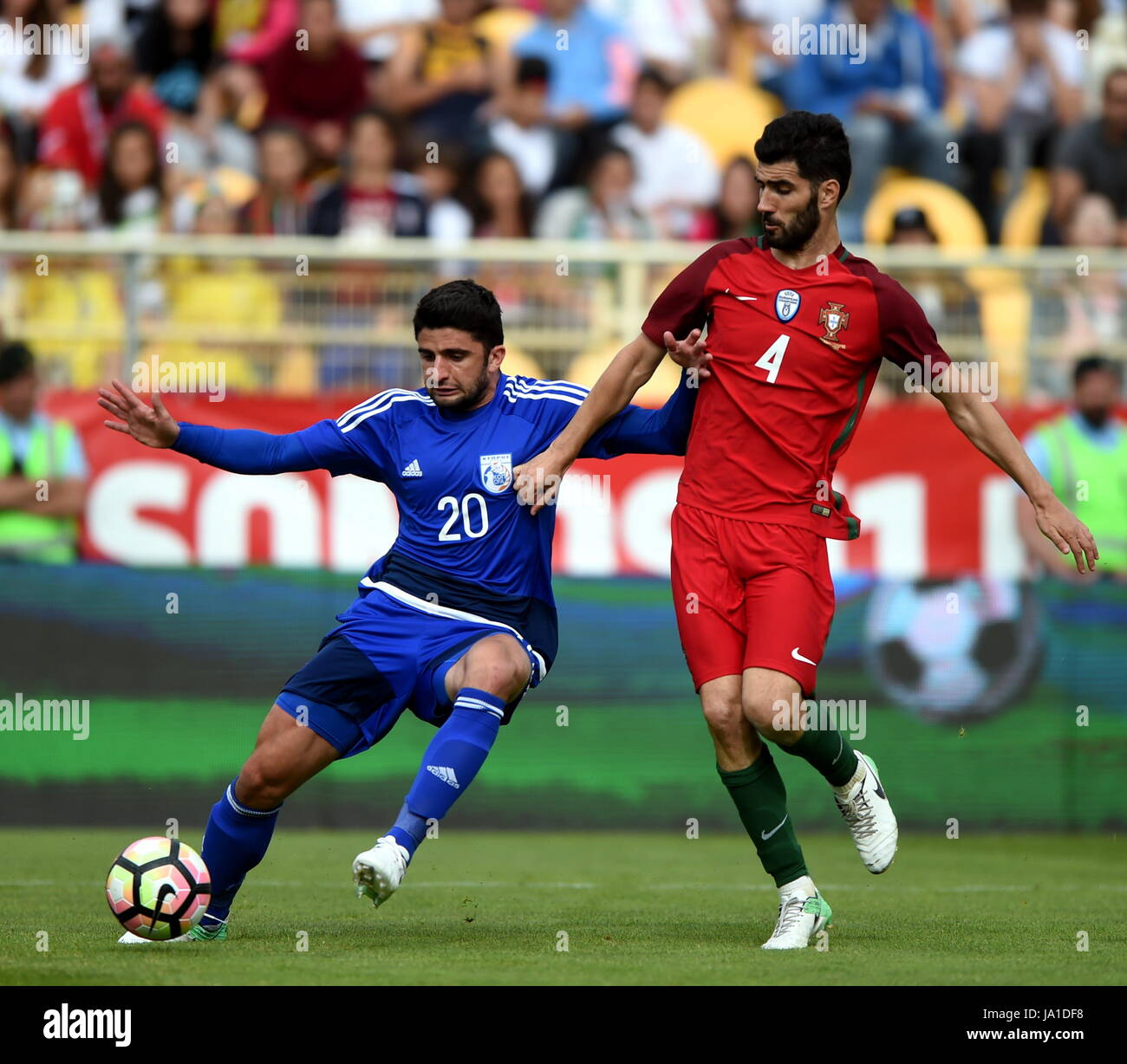 Lisbon, Lisbon. 3rd June, 2017. Portugal's Luis Neto (R) vies with Giorgos Economides of Cyprus during the international friendly soccer match Portugal vs Cyprus at the Antonio Coimbra da Mota stadium in Estoril town, outskirts of Lisbon, on June 3, 2017. Portugal won 4-0. Credit: Zhang Liyun/Xinhua/Alamy Live News Stock Photo