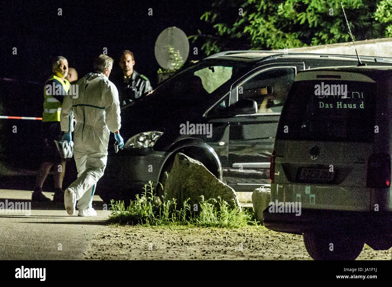 Arnschwang, Germany. 3rd June, 2017. Police officers stand on the premises of an asylum home near Arnschwang, Germany, 3 June 2017. Two people died in a dramatic incident at a home for asylum applicants on Saturday. A 41-year-old man from Afghanistan captured a five-year-old boy from Russia and injured him fatally. The officers called to the location shot the Afghan and hit him fatally. Photo: Armin Weigel/dpa/Alamy Live News Stock Photo