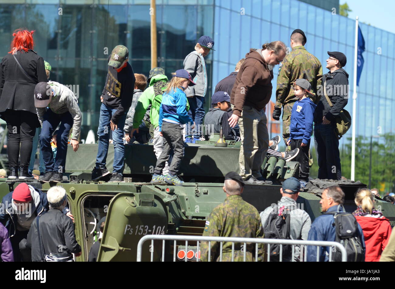 People Checking War Tank at Helsinki. Stock Photo