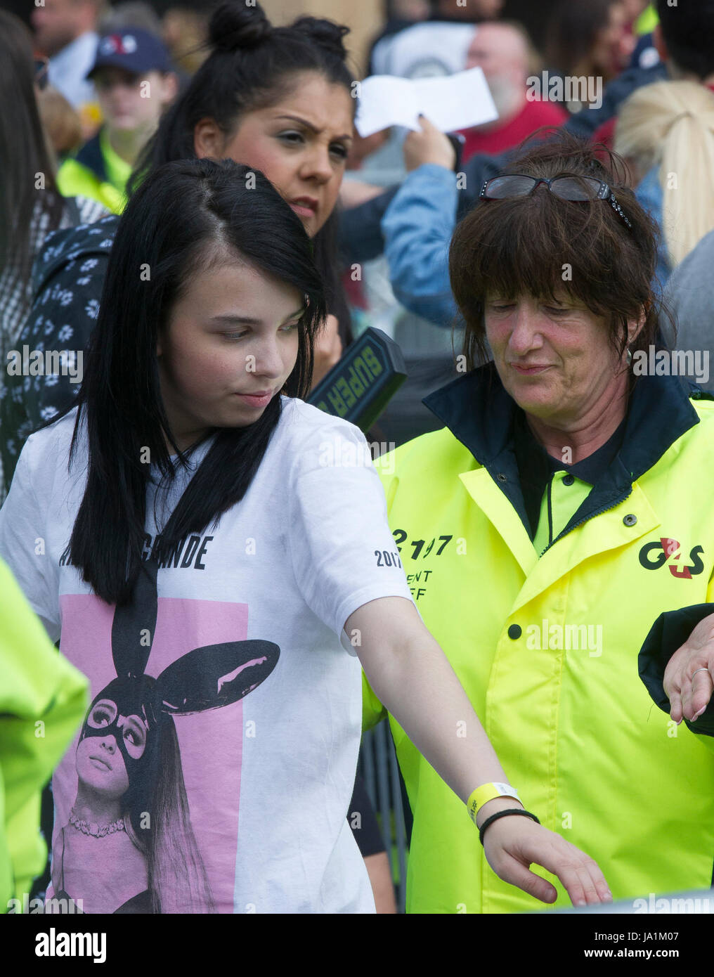 Manchester, UK. 4th June, 2017. Young Ariana Grande fan is scanned with tight security with armed police at the One love concert at the Emirates Old Trafford stadium. Manchester Picture Credit: GARY ROBERTS/Alamy Live News Stock Photo