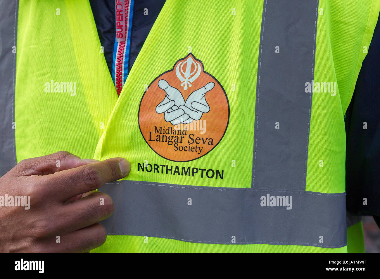 Northampton, Abington St, 4th June 2017. Volunteers from across the Muslim communities in Northampton share food with the homeless, bringing together between 60 and 70 homeless people from around the town to share some of the specially prepared food between 6pm and 7pm, the food which is made to break their daily fast in the evening, this happens every Sunday throughout Ramadan after their daily fasting has stopped. Credit: Keith J Smith./Alamy Live News Stock Photo