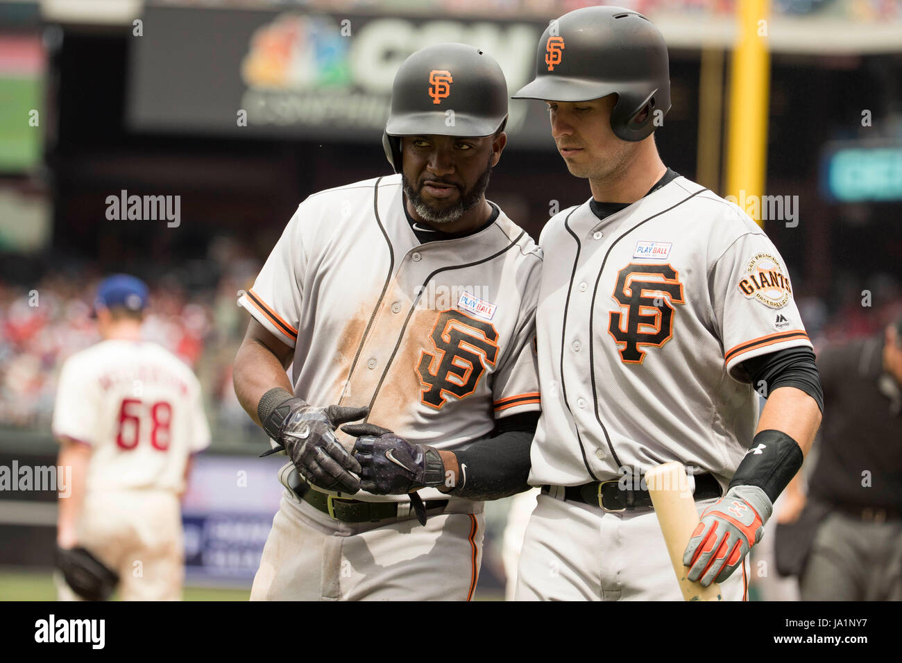 Philadelphia, Pennsylvania, USA. 4th June, 2017. San Francisco Giants center fielder Denard Span (2) listens to catcher Buster Posey (28) after he scores on the sacrifice fly by Posey during the MLB game between the San Francisco Giants and Philadelphia Phillies at Citizens Bank Park in Philadelphia, Pennsylvania. Christopher Szagola/CSM/Alamy Live News Stock Photo