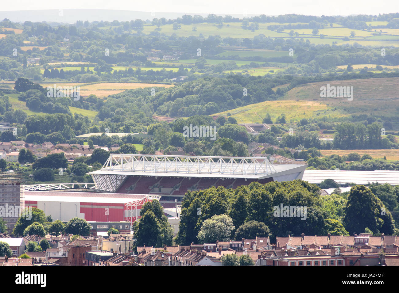 Bristol, England - July 17, 2016: Ashton Gate Stadium, home of Bristol City Football Club, standing in the south Bristol cityscape with the hills of N Stock Photo
