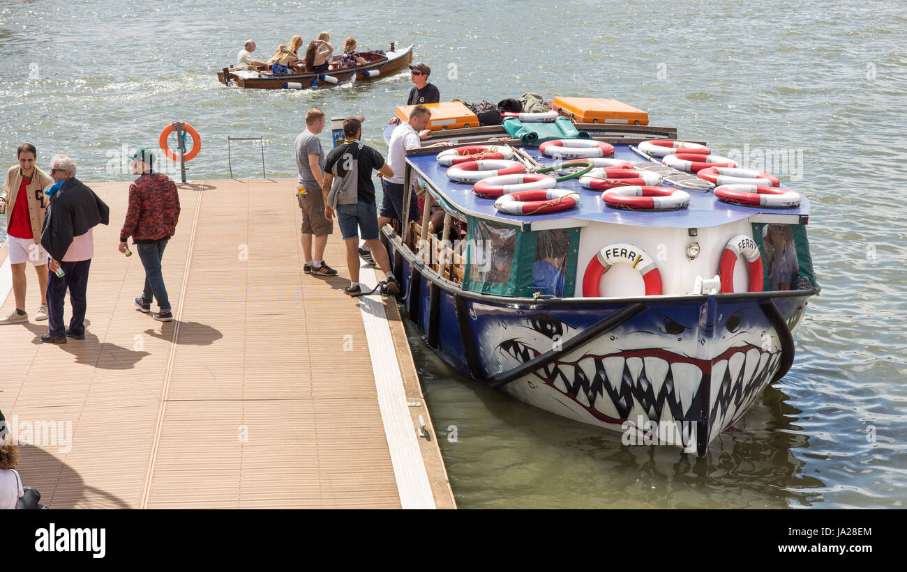 Bristol, England, UK July 17, 2016 Passengers board a city ferry