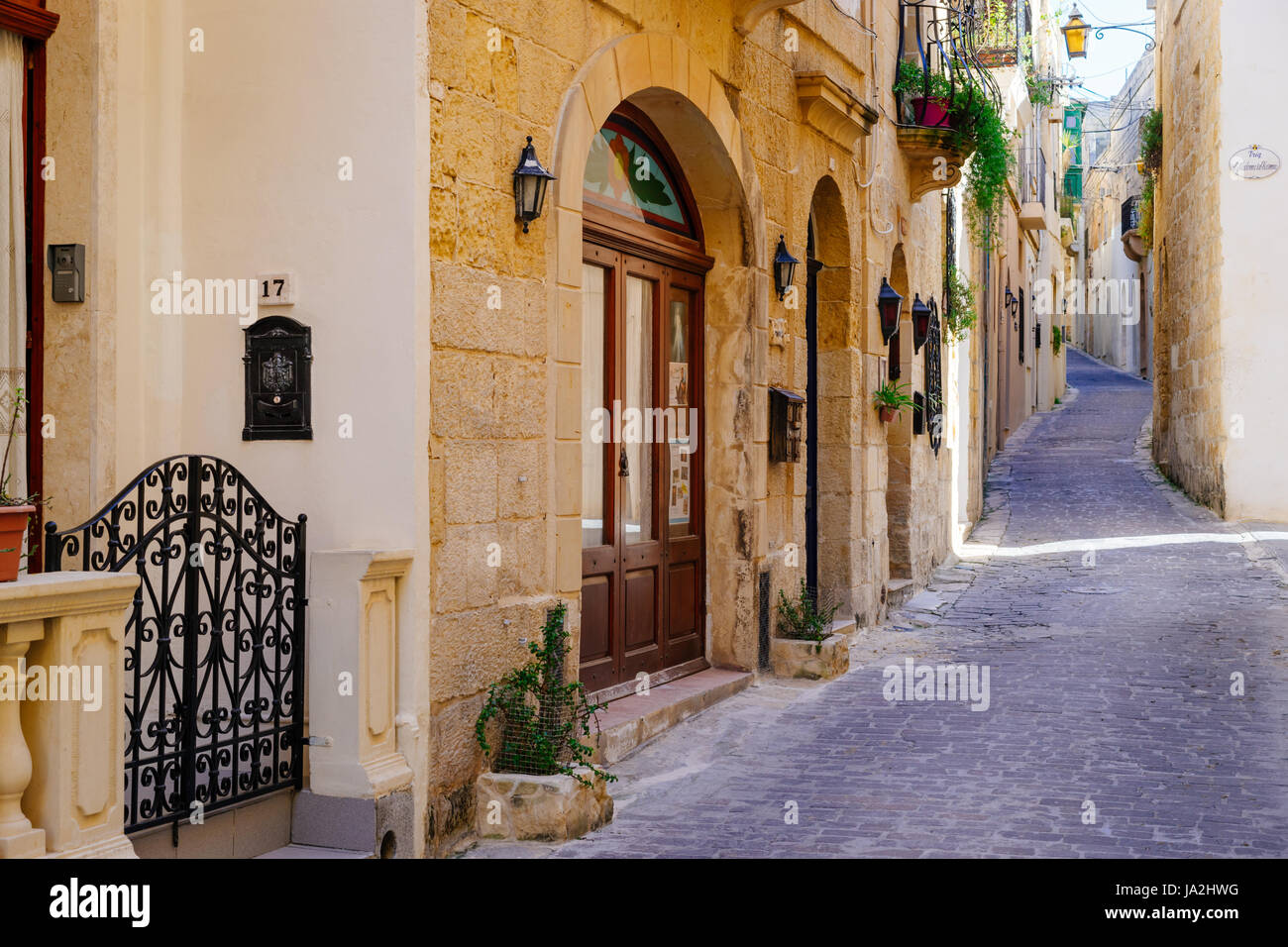Narrow street of ancient city Rabat with traditional maltese houses