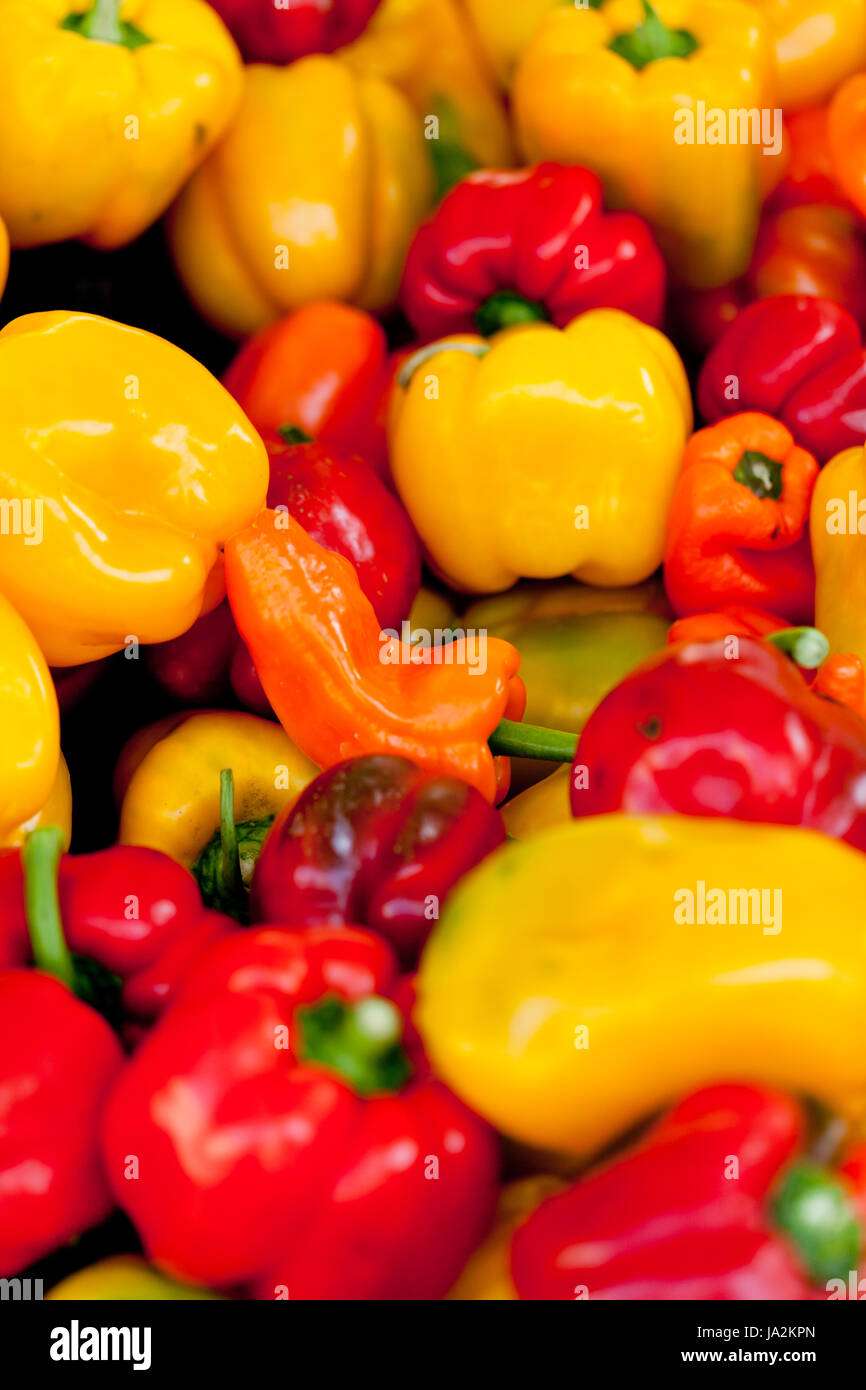 red yellow green peppers macro on the market Stock Photo - Alamy