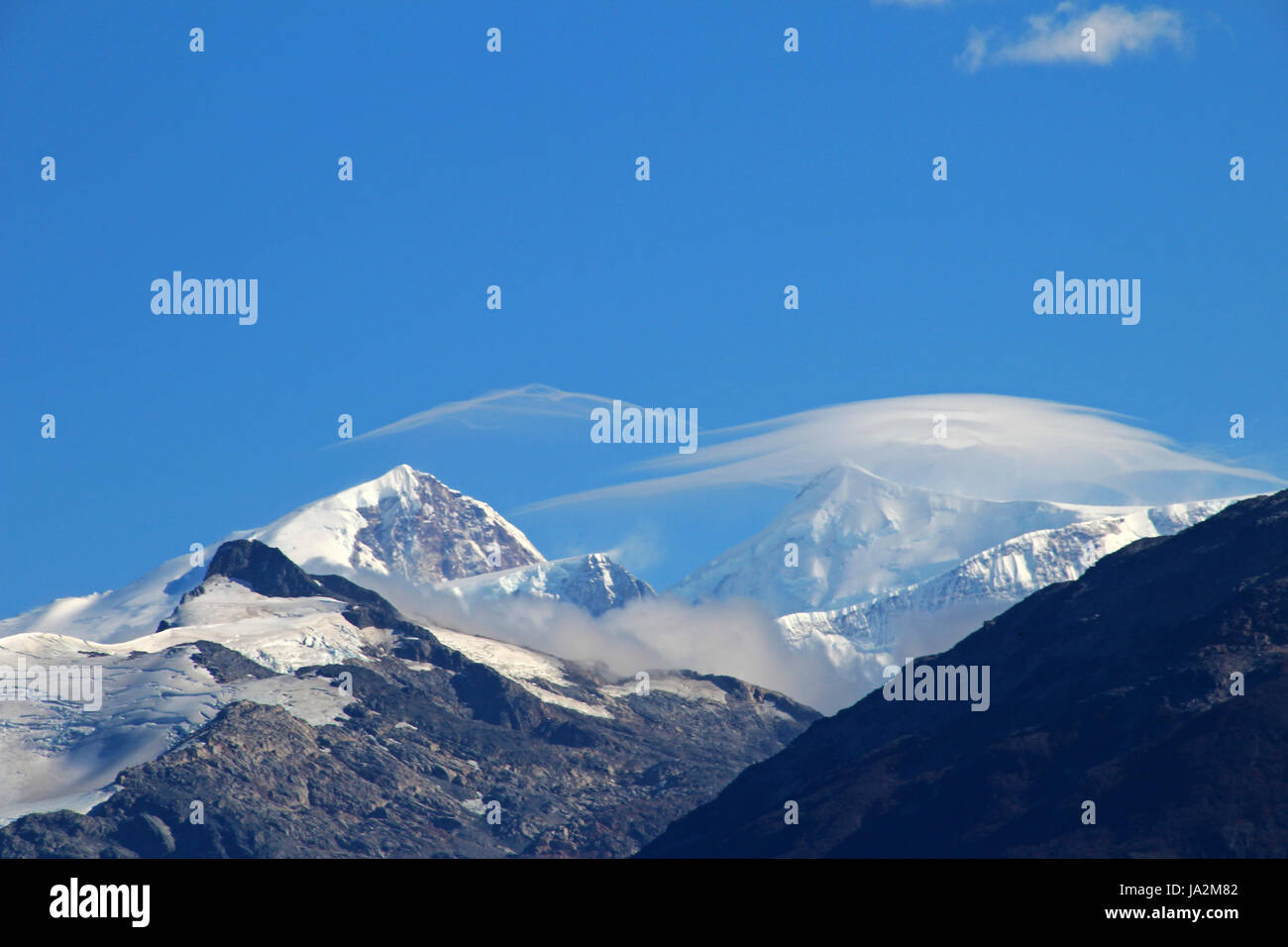 Typical foehn clouds, altocumulus lenticularis lent, in the mountains, Patagonia, Chile Stock Photo