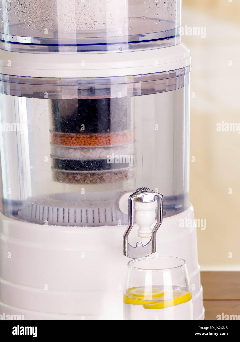 Close up of a filter system of water purifier on a kitchen background Stock Photo