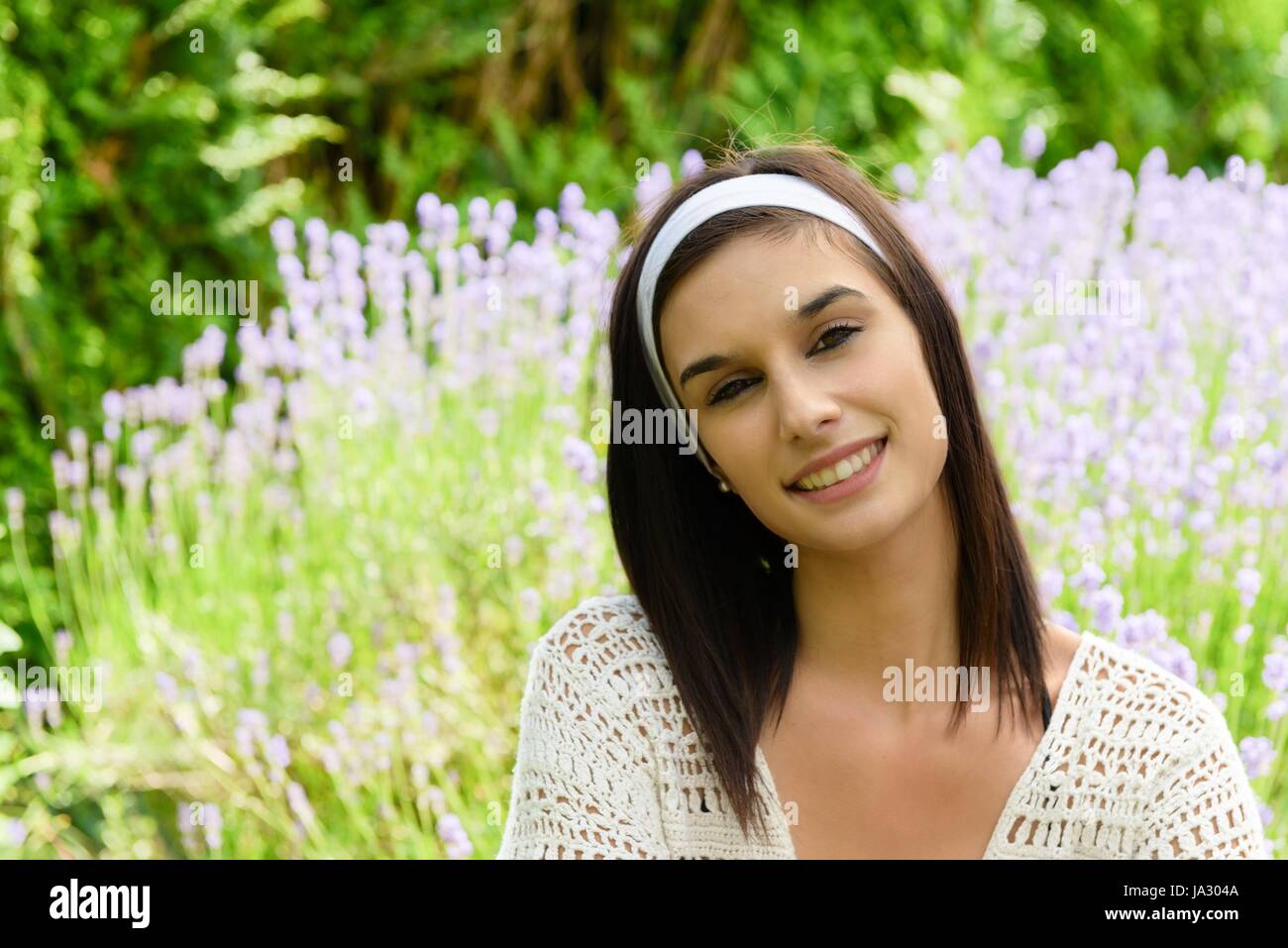 a portrait of beautiful happy young woman outdoors Stock Photo - Alamy
