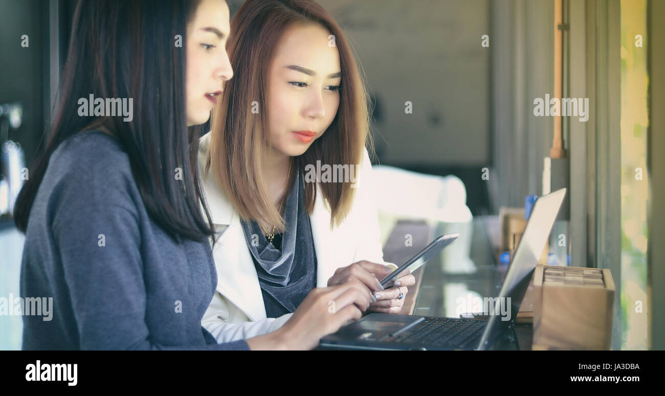 Two asian woman business meeting hi-res stock photography and images ...