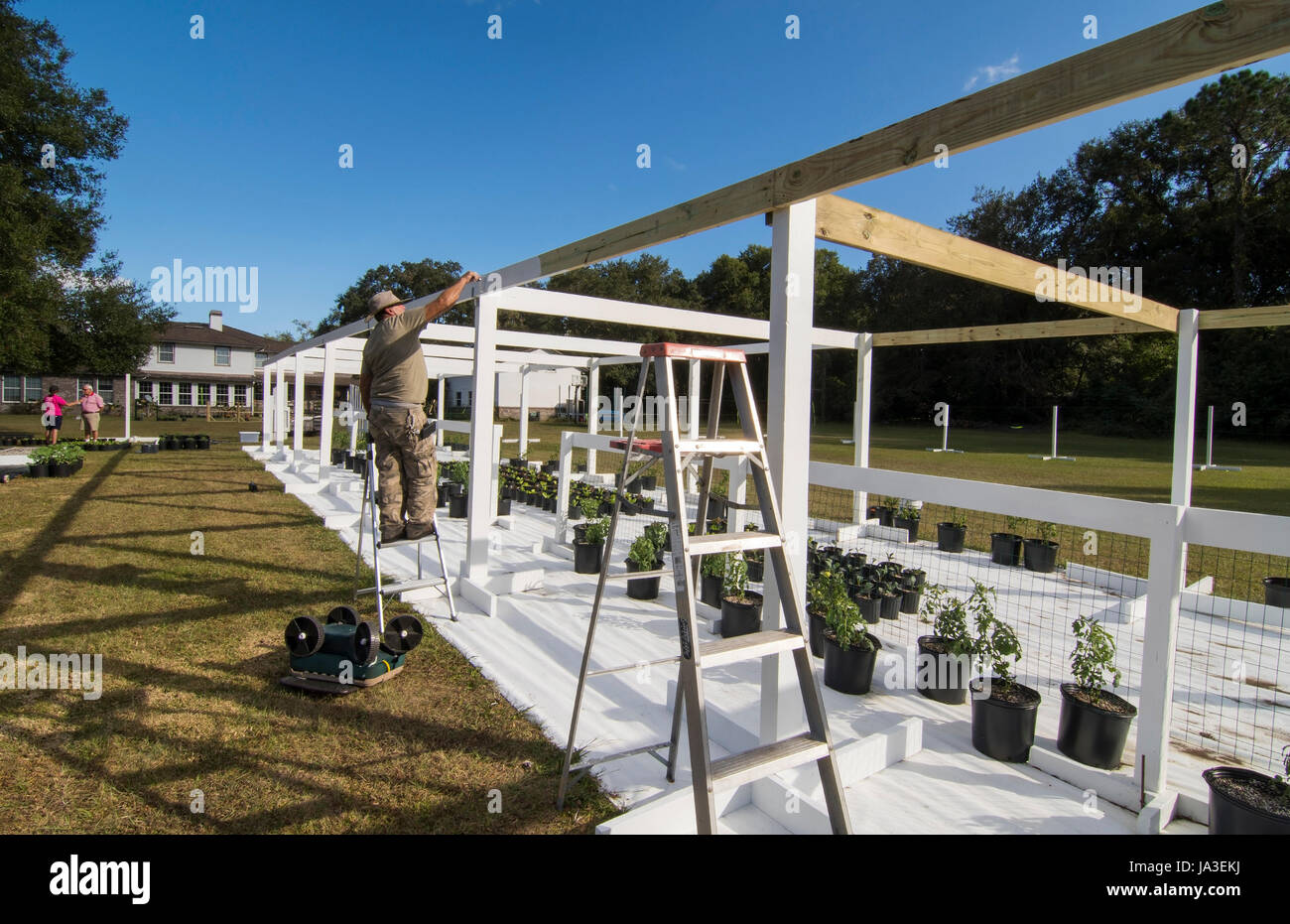 Central Florida Home Organic Garden greenhouse being constructed with