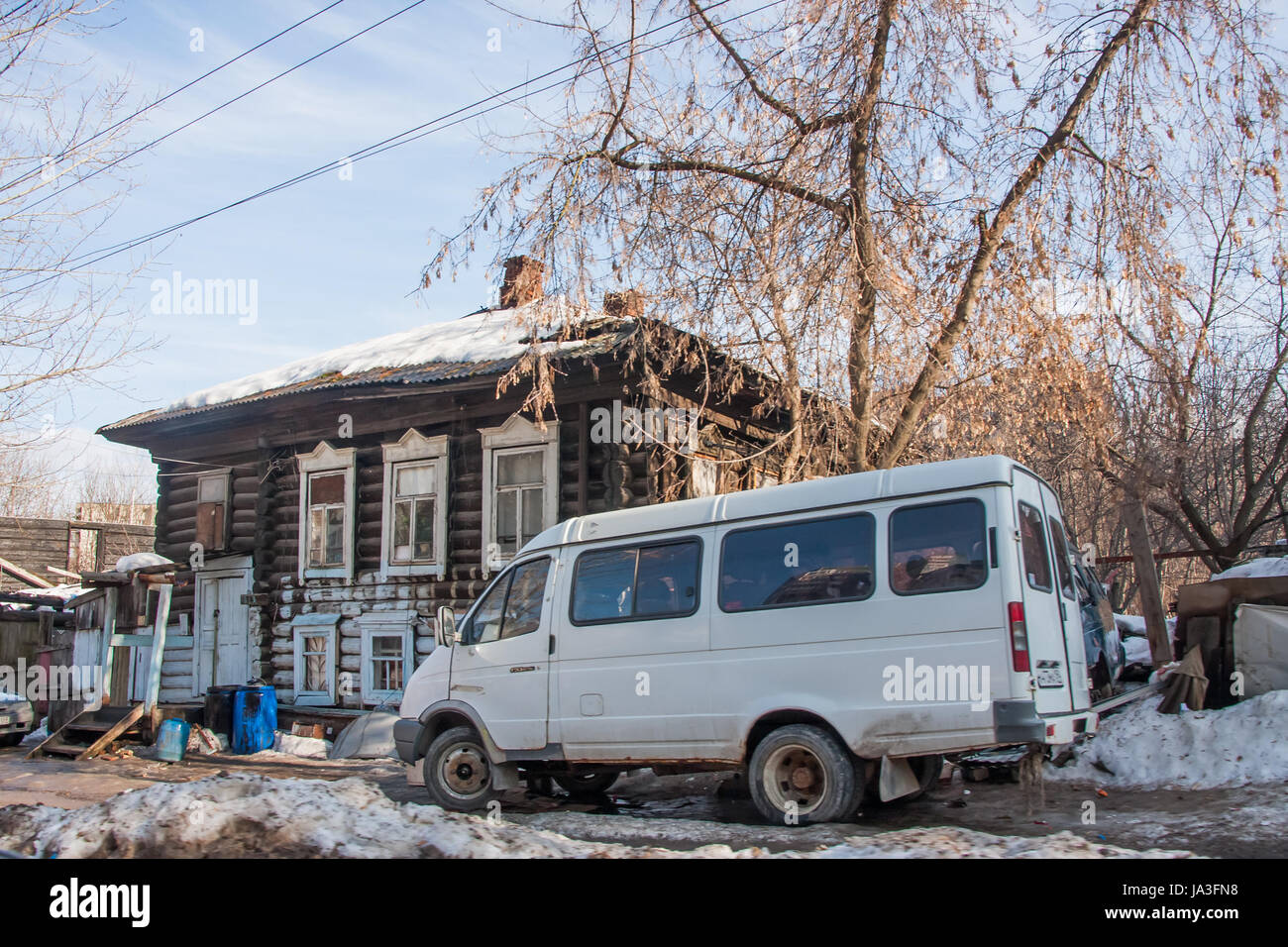 Perm, Russia - March 31.2016: Old ruined two-storey wooden house Stock Photo