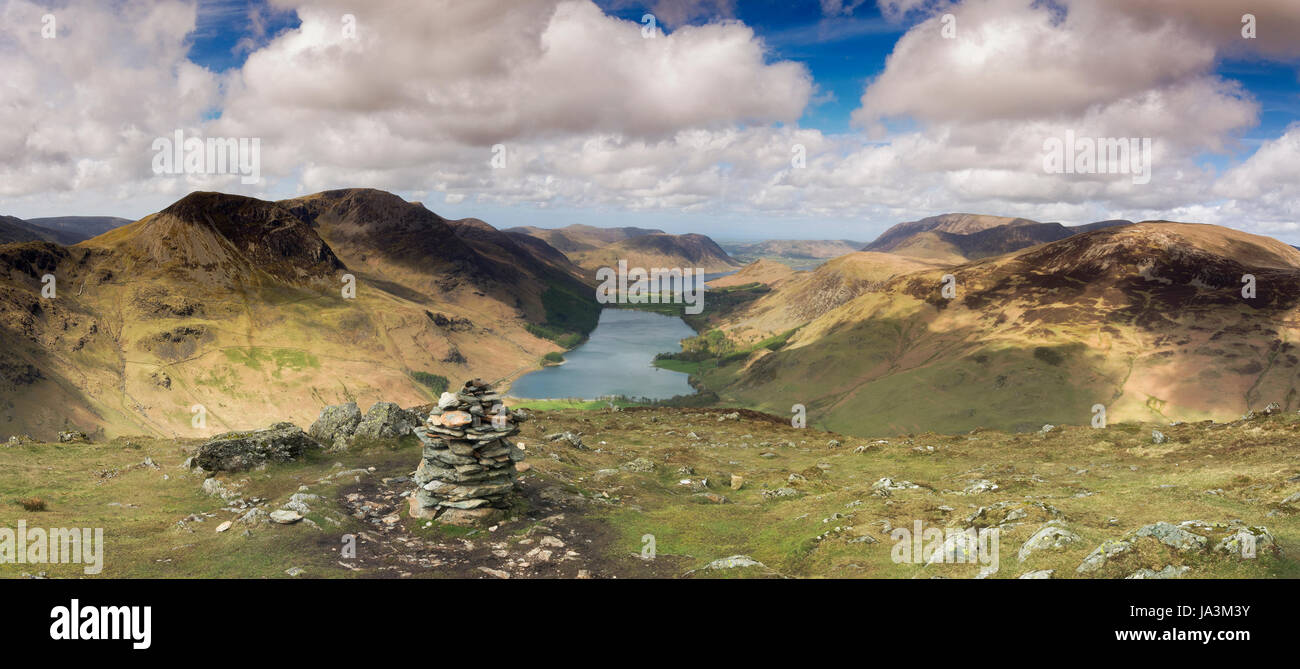 A view along the length of Buttermere and Crummock water from the cairn on Fleetwith pike with Buttermere fell on the right and high crag on the left Stock Photo