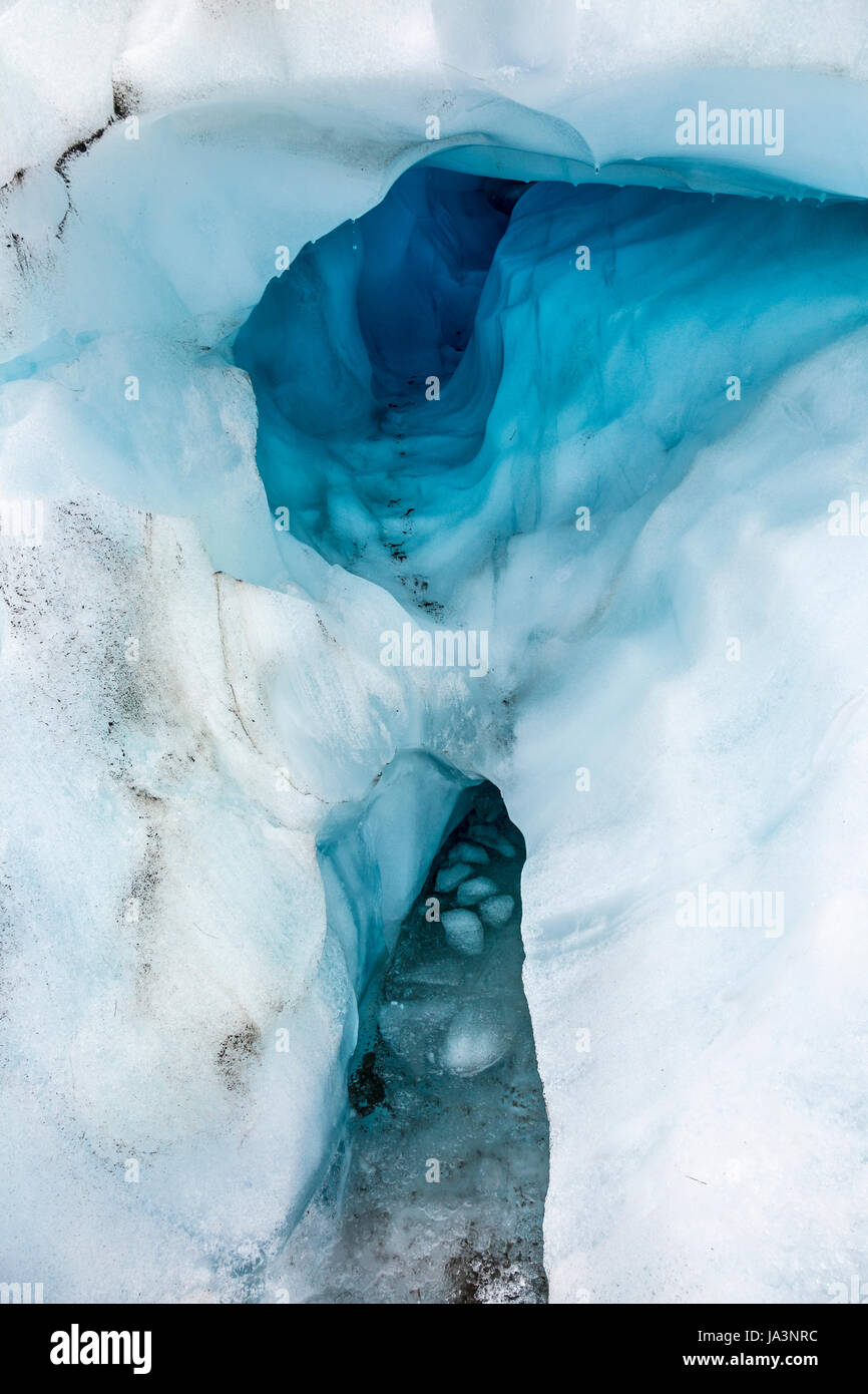 Ice caves in the surface of a glacier, Fox Glacier, South Island, New Zealand Stock Photo