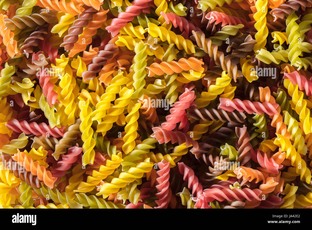 abstract background of colored pasta texture close-up Stock Photo - Alamy