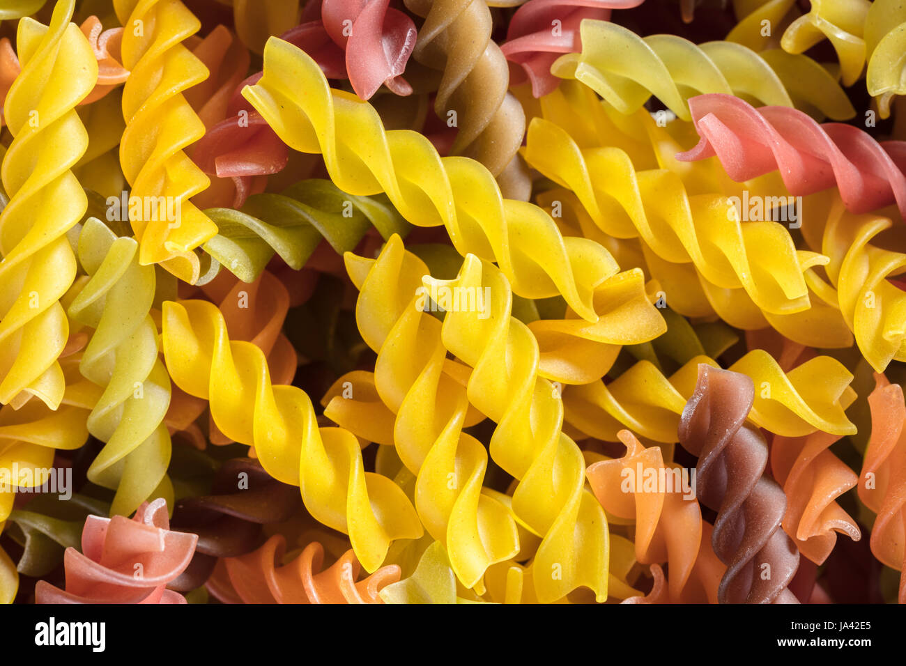 abstract background of colored pasta texture close-up Stock Photo - Alamy
