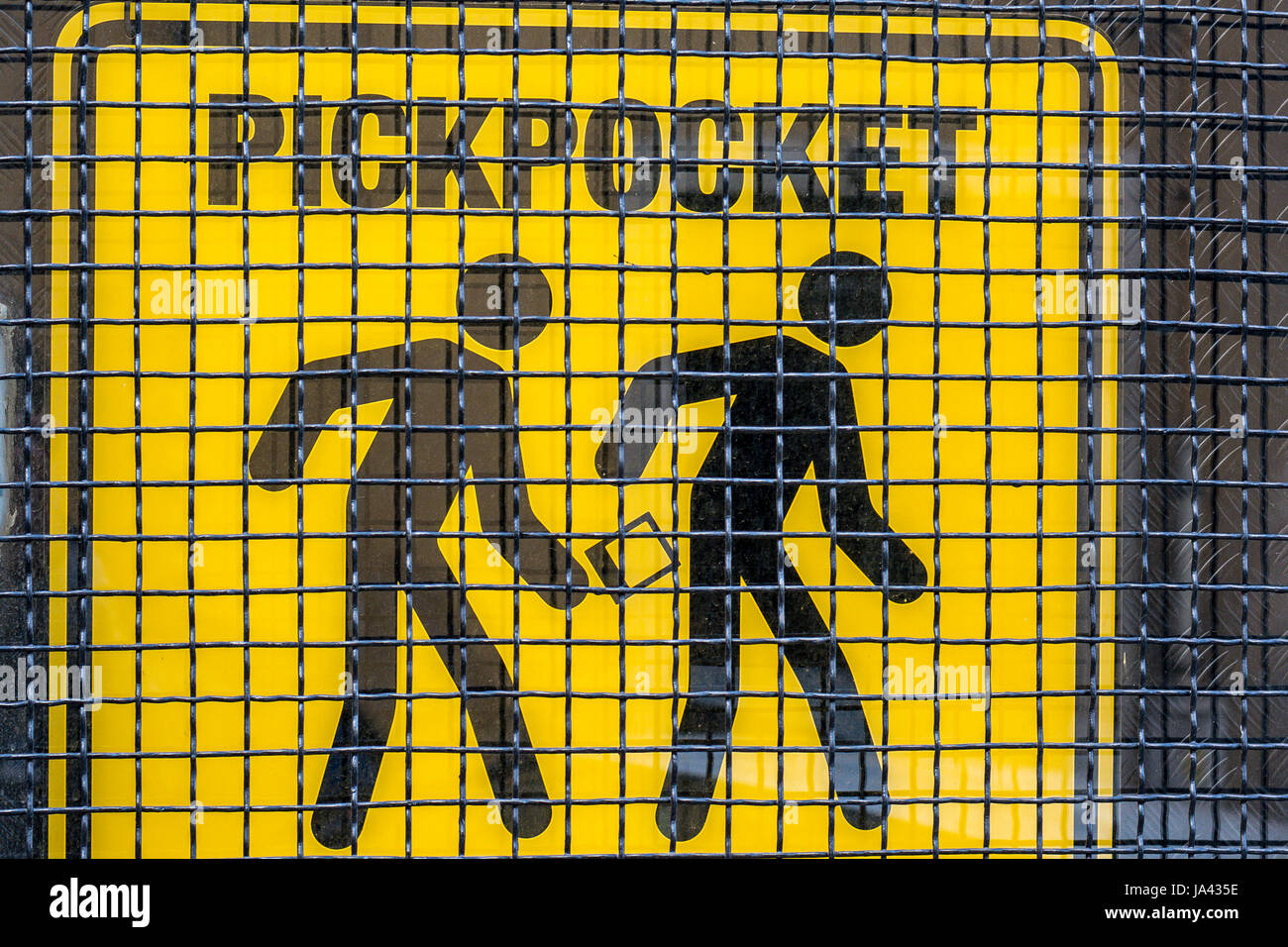 Pickpocket gallery - a warning sign black on yellow background Stock Photo