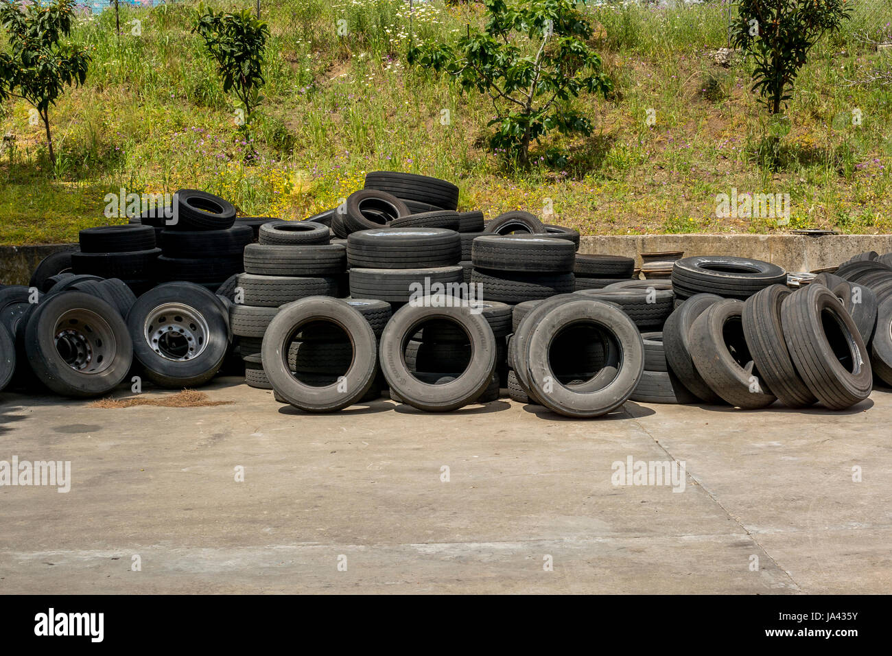 Tires new and used Stock Photo