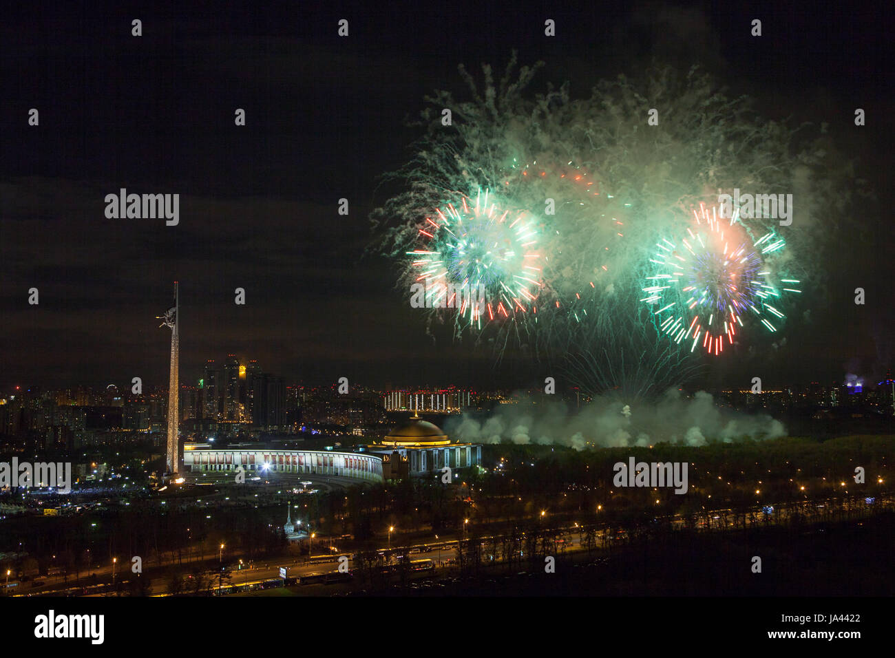 Bright fireworks explosions in night sky in Moscow, Russia Stock Photo