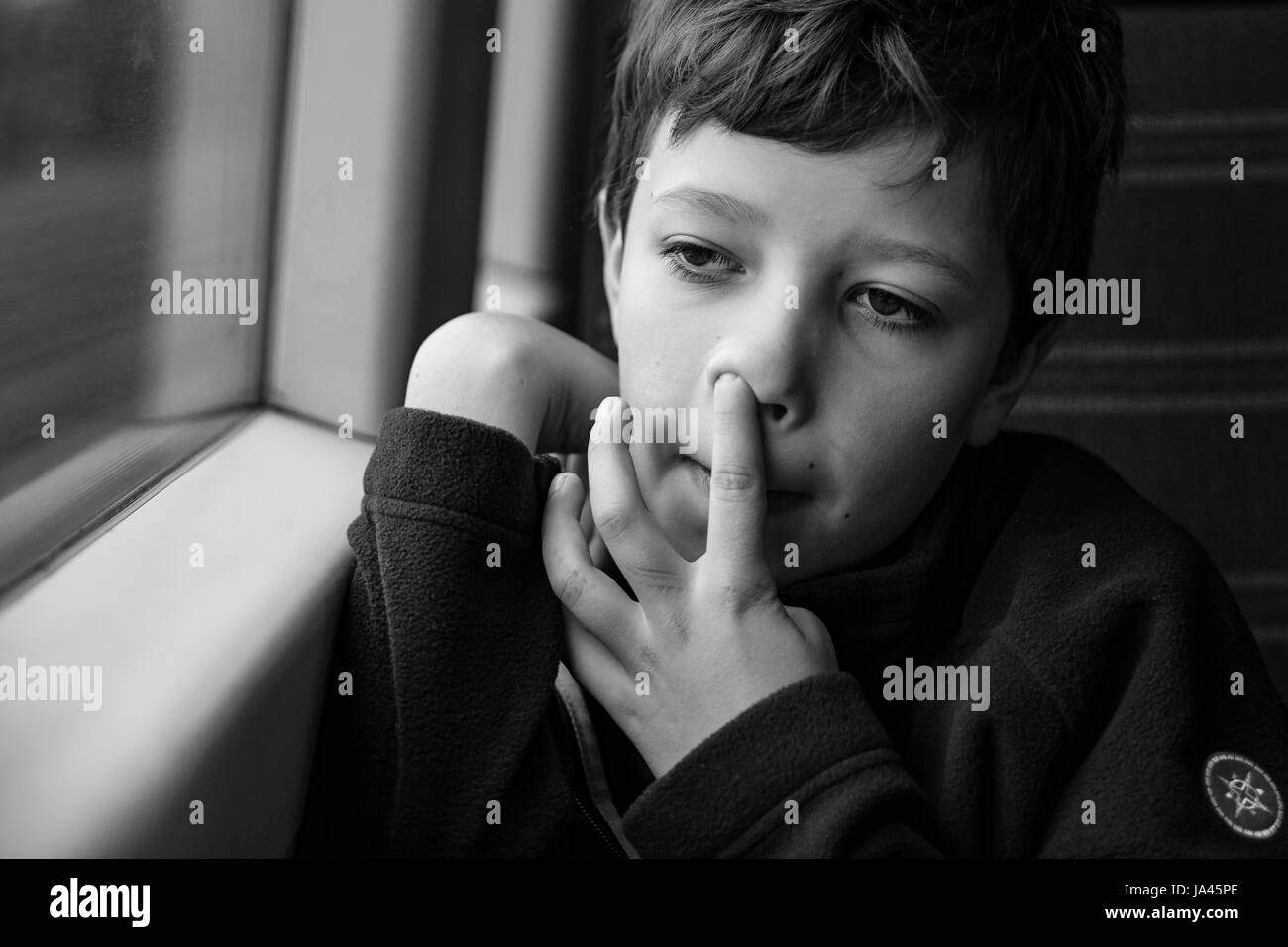 A boy portrait, young little cute and adorable man, little obstreperous scamp. Stock Photo