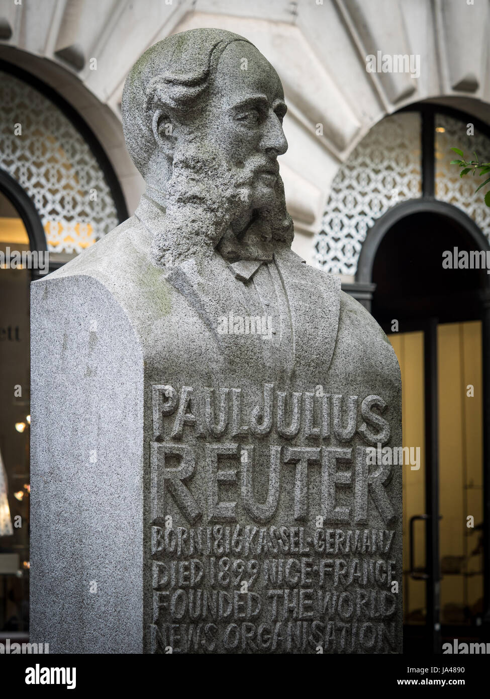 Bust of Paul Julius Reuter near the Royal Exchange in the City of London. Pioneer of telegraphy and journalism, he founded the Reuters News Agency. Stock Photo