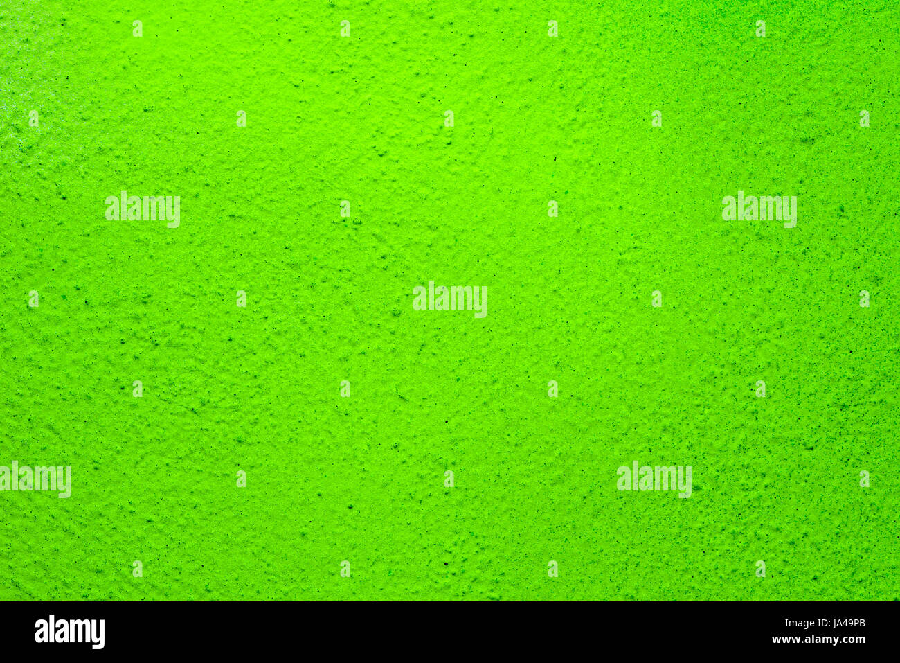 green color painted wall background texture Stock Photo