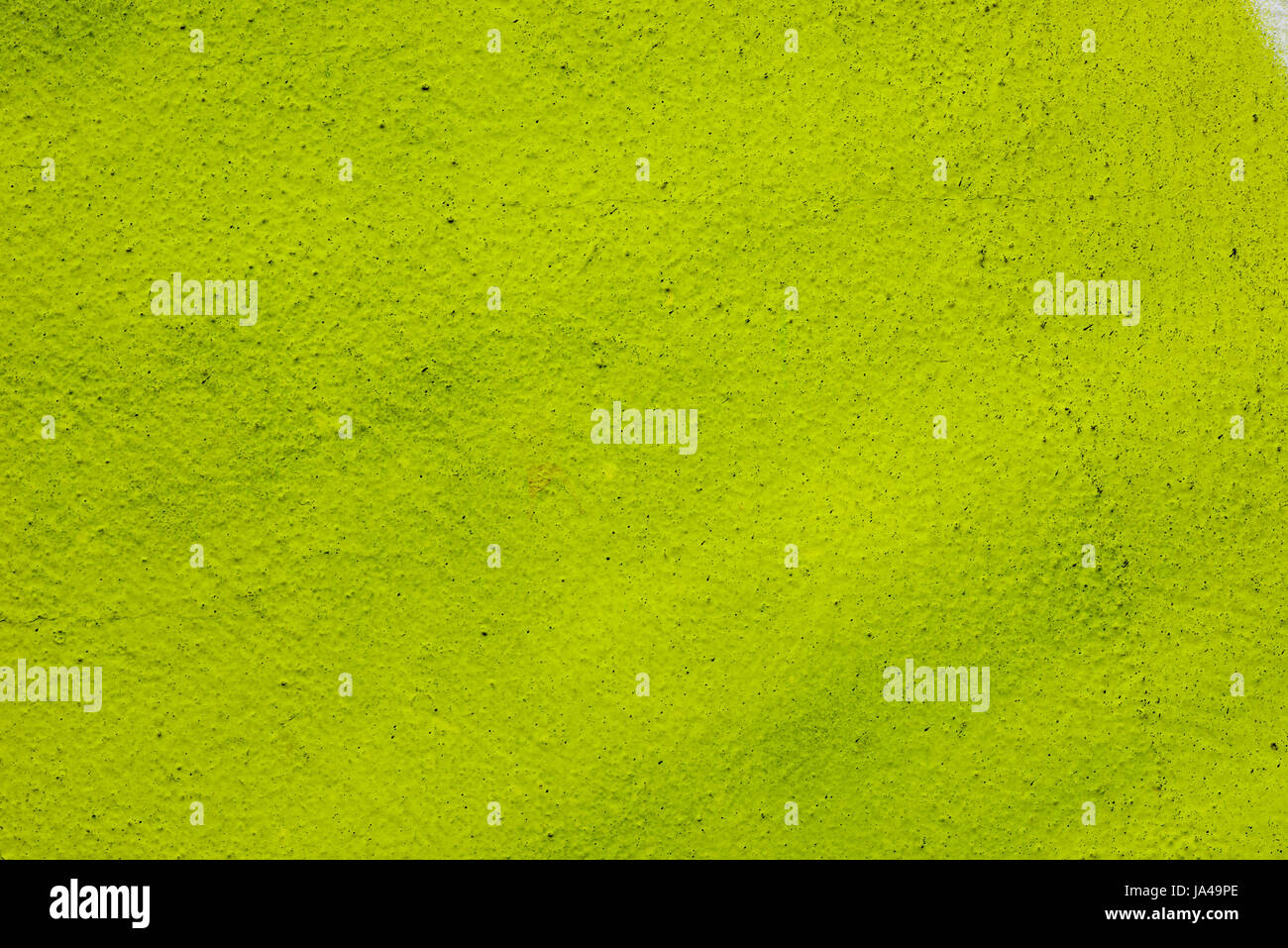 yellow color painted wall background texture Stock Photo