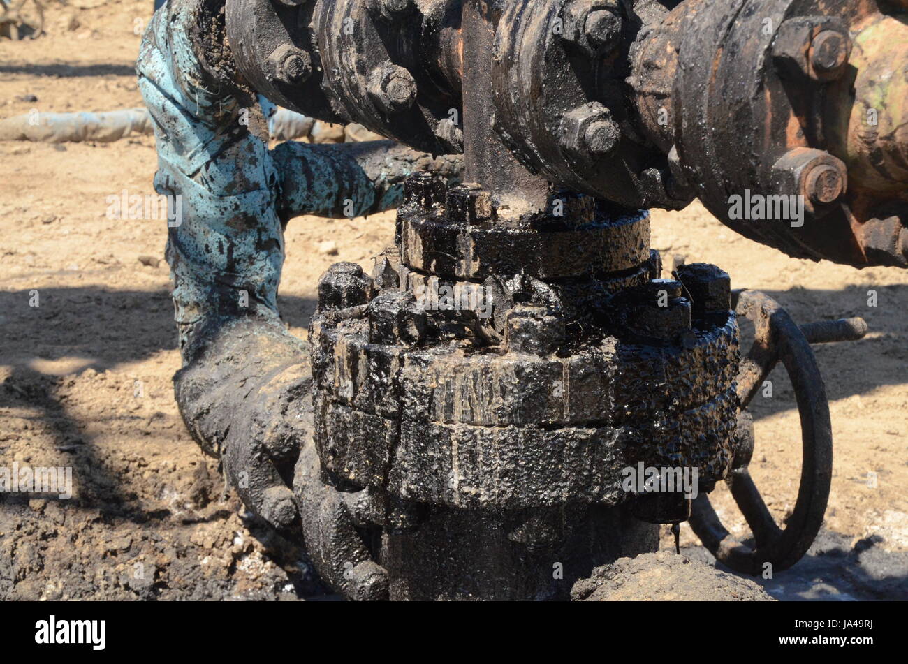 Oil jackhammers Xinjiang China. Nodding donkeys pumping up oil Stock