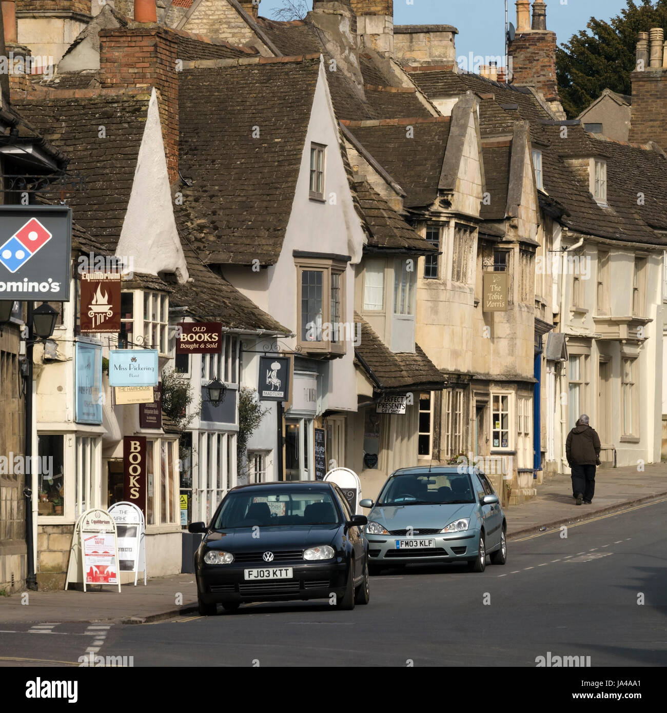 Old traditional shop and house fronts, St Paul's Street, Stamford, Lincolnshire, England, UK Stock Photo