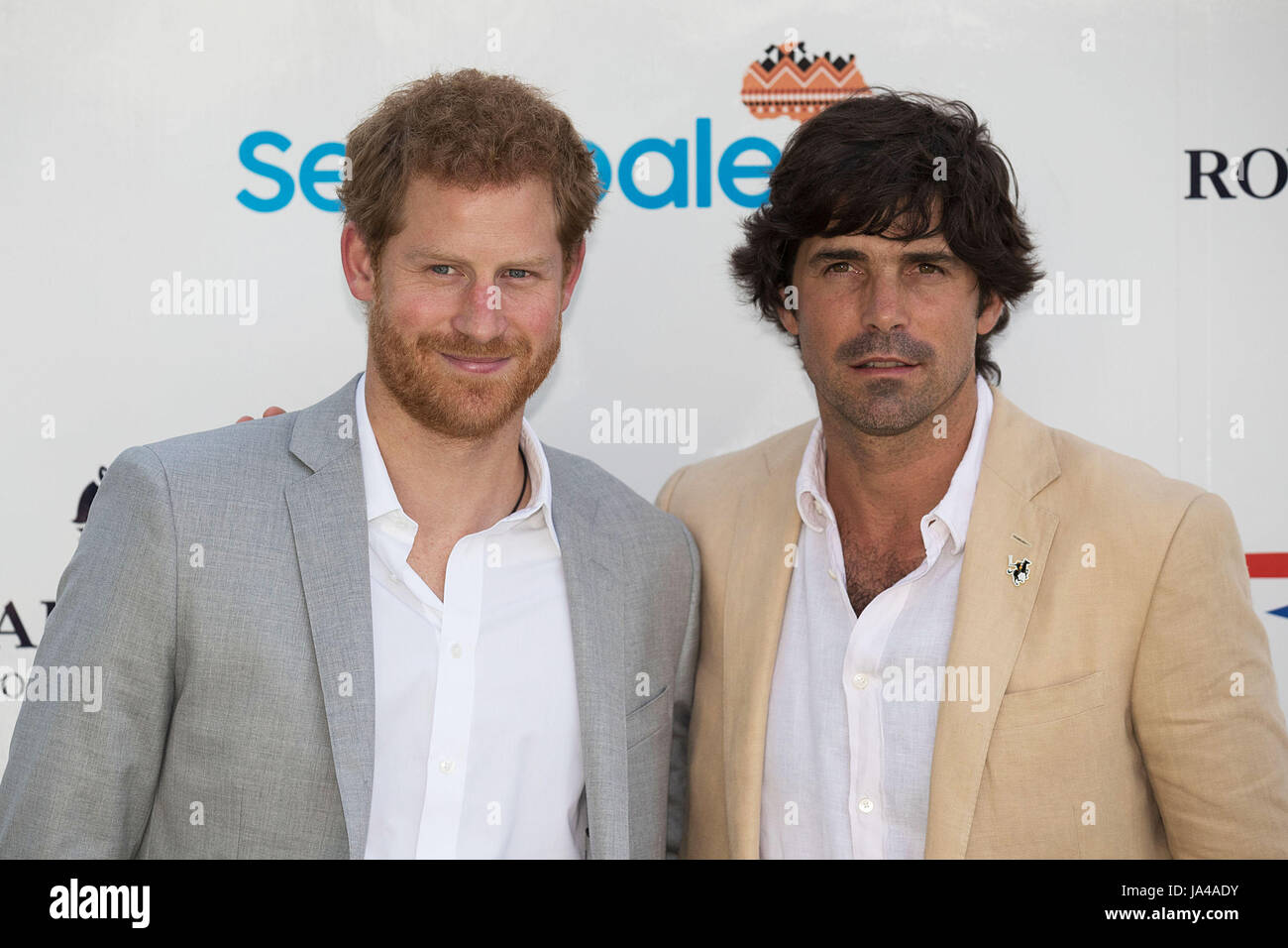 Prince Harry with Nacho Figueras arriving to take part in the Sentebale Royal Salute Polo Cup at the Singapore Polo Club. Stock Photo