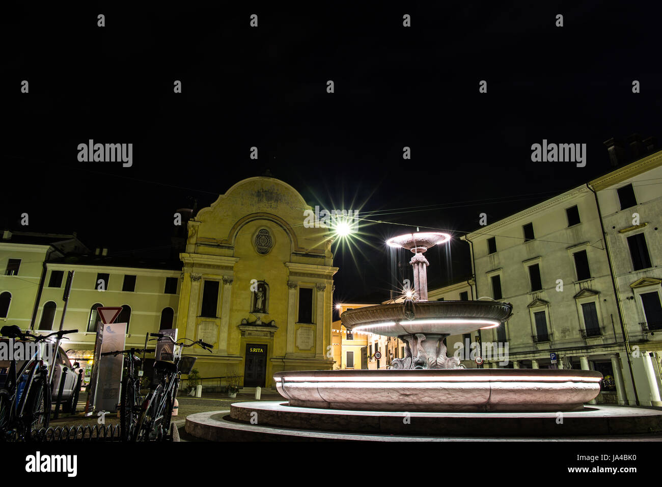 Church with illuminated fountain at night Stock Photo - Alamy