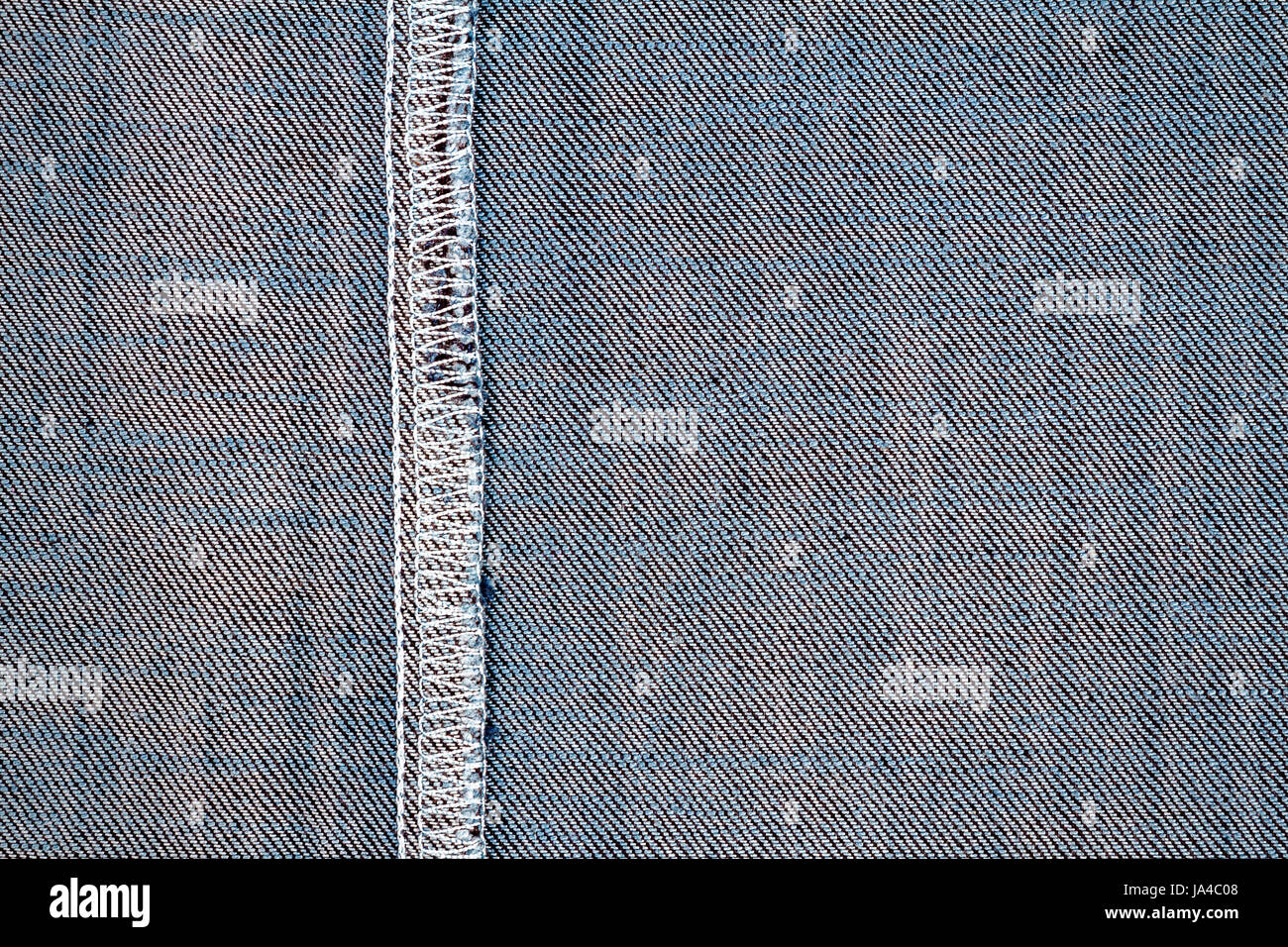 Wrong side of jeans fabric with back seam Stock Photo - Alamy