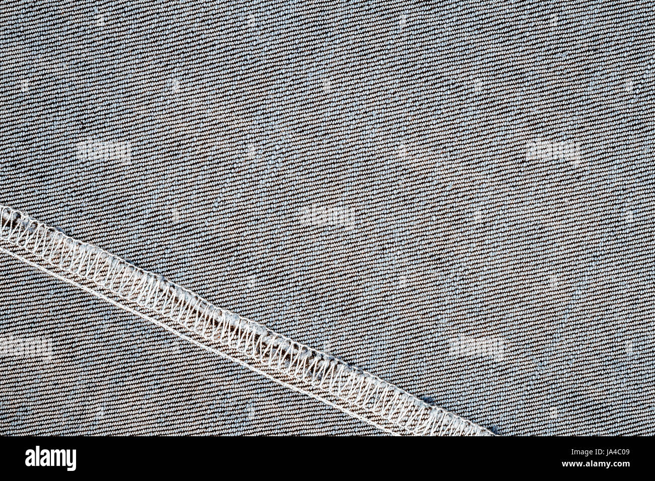 Wrong side of jeans fabric with back seam Stock Photo - Alamy