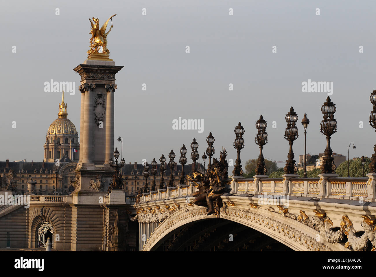 The Pont Alexandre III is a deck arch bridge that spans the Seine in Paris, France. Stock Photo