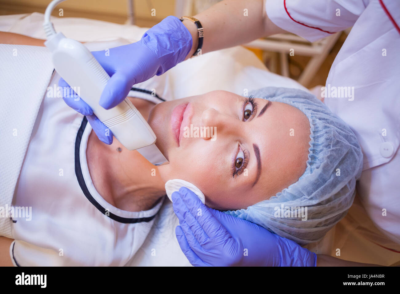 the-doctor-makes-a-woman-patient-procedures-on-face-spa-stock-photo-alamy