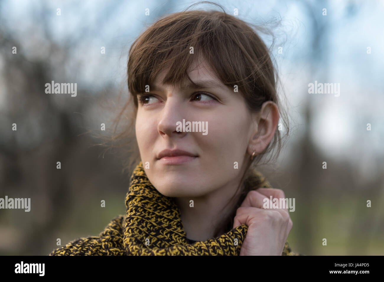 Portrait of a lonely girl in profile. Stock Photo