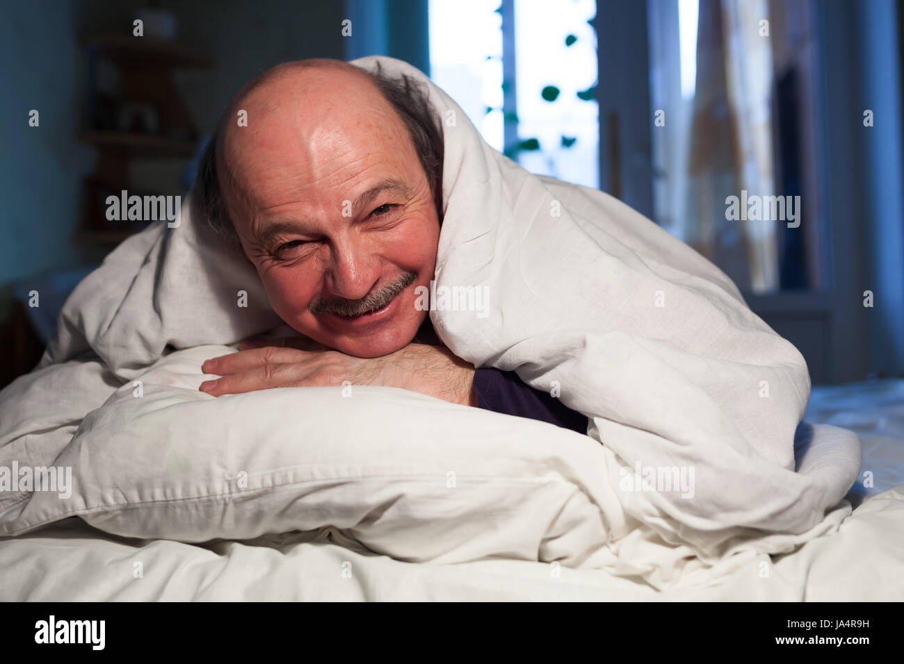 Old man sleep bed hi-res stock photography and images - Alamy