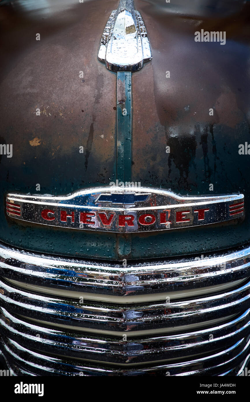 Close up of the hood and front grill of a rusty Chevrolet truck Stock Photo