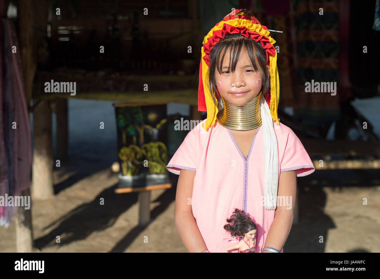 Karen long neck girl in a  village between Chiang Rai and Chiang Mai. Karen is one of several ethnic hill tribes in northern Thailand Stock Photo