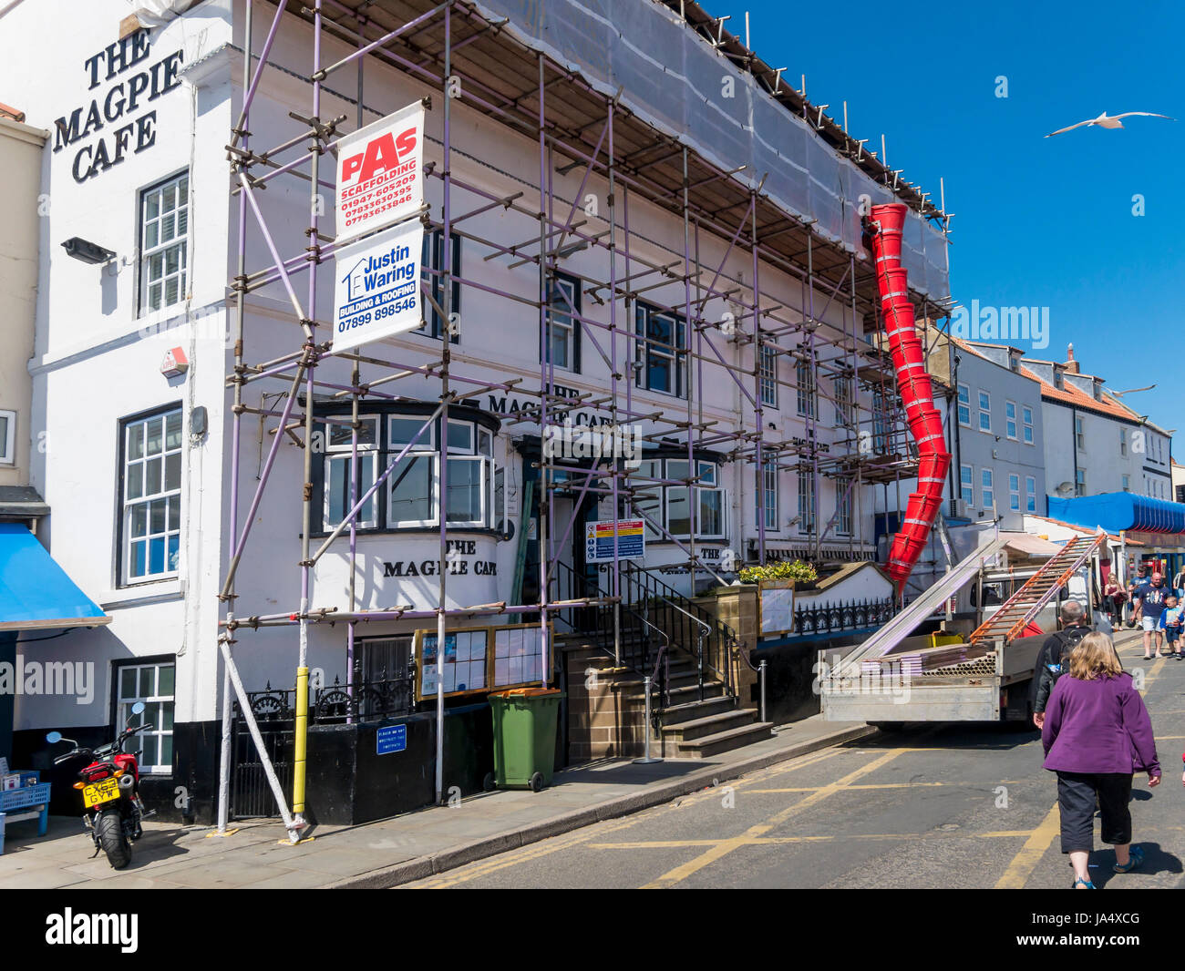 The famous Magpie Café in Pier Road Whitby closed for business and under extensive repairs after a fire damaged the building in May 2017 Stock Photo